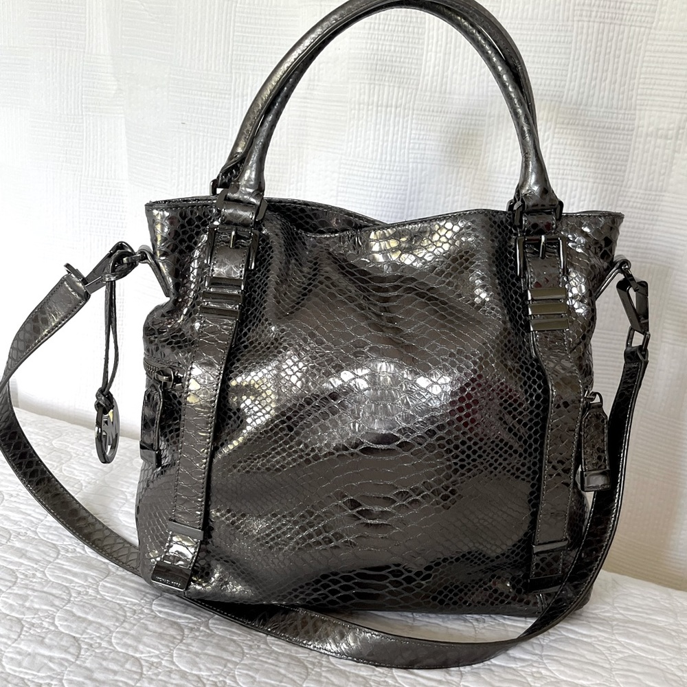 Michael Kors handbag in platinum with animal print relief in the leather. NWOT